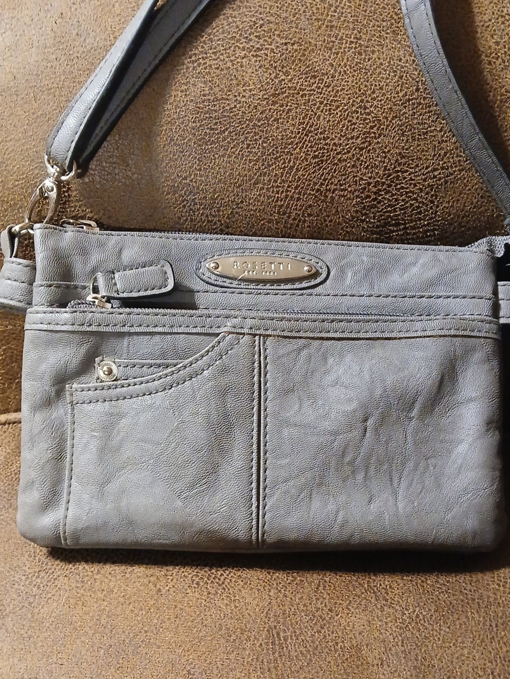Rosetti Light Gray Crossbody Bag with Front Pockets